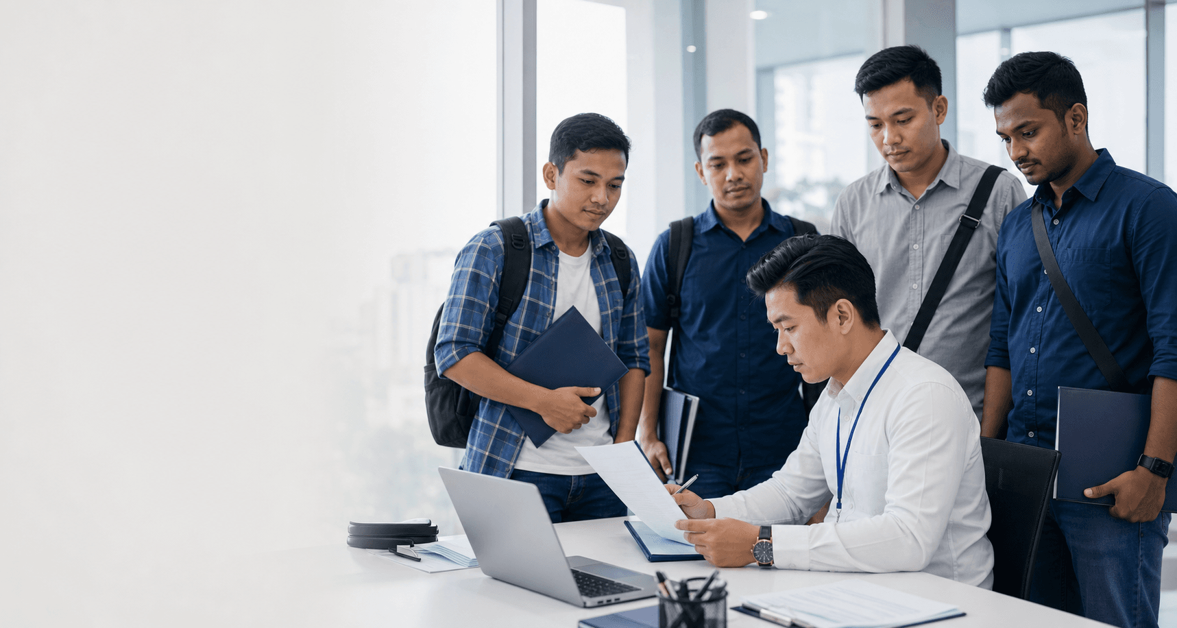 EMPAGE PRO consultant reviewing candidate documents with a hiring team
